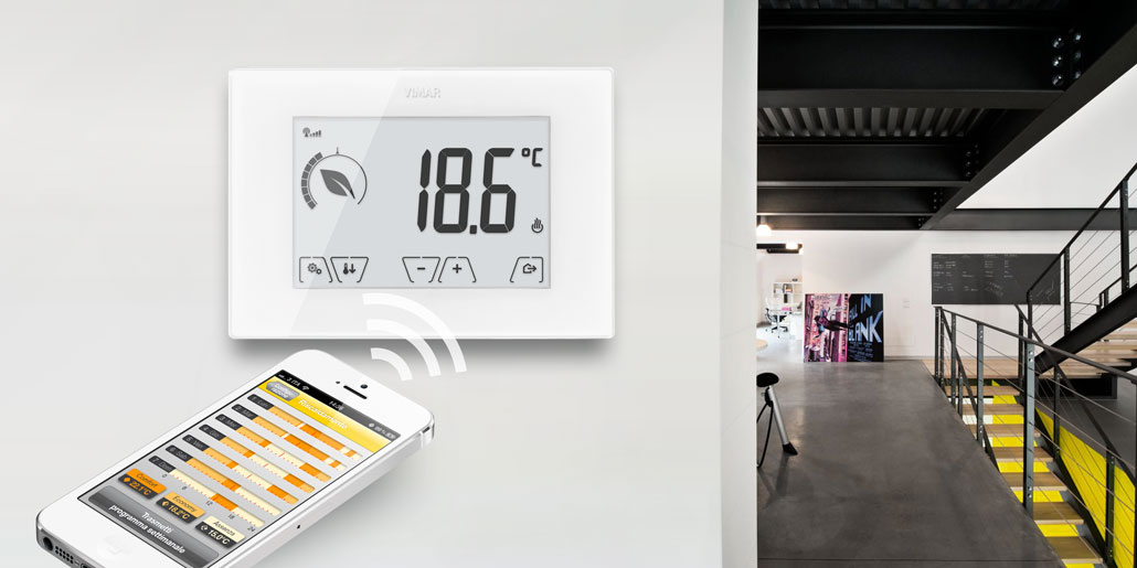 Wifi thermostat with Ecometer for energy efficient heating with large high-contrast lcd display for best readability in crystal white housing Esthetics and Interaction designed by quickpartners. in contemporary design villa