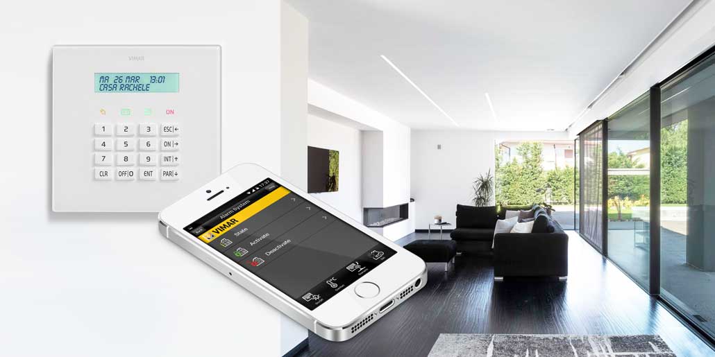 Vimar By-Phone App for remote control of automated homes with SMS and GSM cellphones and smartphones. Activation of Bimar alarm system By-Alarm in white elegant modern villa