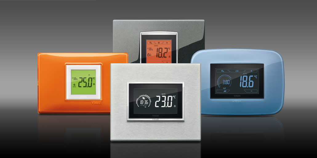 Thermostats Clima & Energy for decorative frames of series Evo black , Eikon Aluminium, Arke Reflex glue and Plana Reflex orange . Comfort and energy efficiency combined with precious design and perfect readability from distance. Multicolor display adapts to characteristic color of each series. Programmable with By clima app with audio connection. Perfect User experience in all aspects.